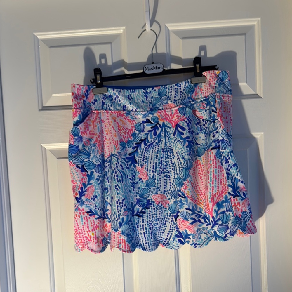 Lilly Pulitzer Blue and Pink  Skort with coral and sea fan pattern.